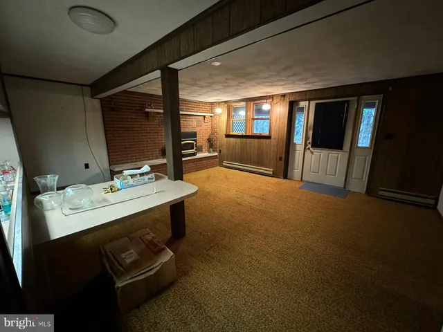 a bathroom with a sink double vanity granite and a large mirror