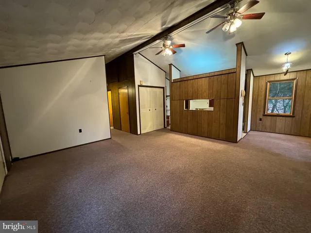 a view of empty room with painted walls