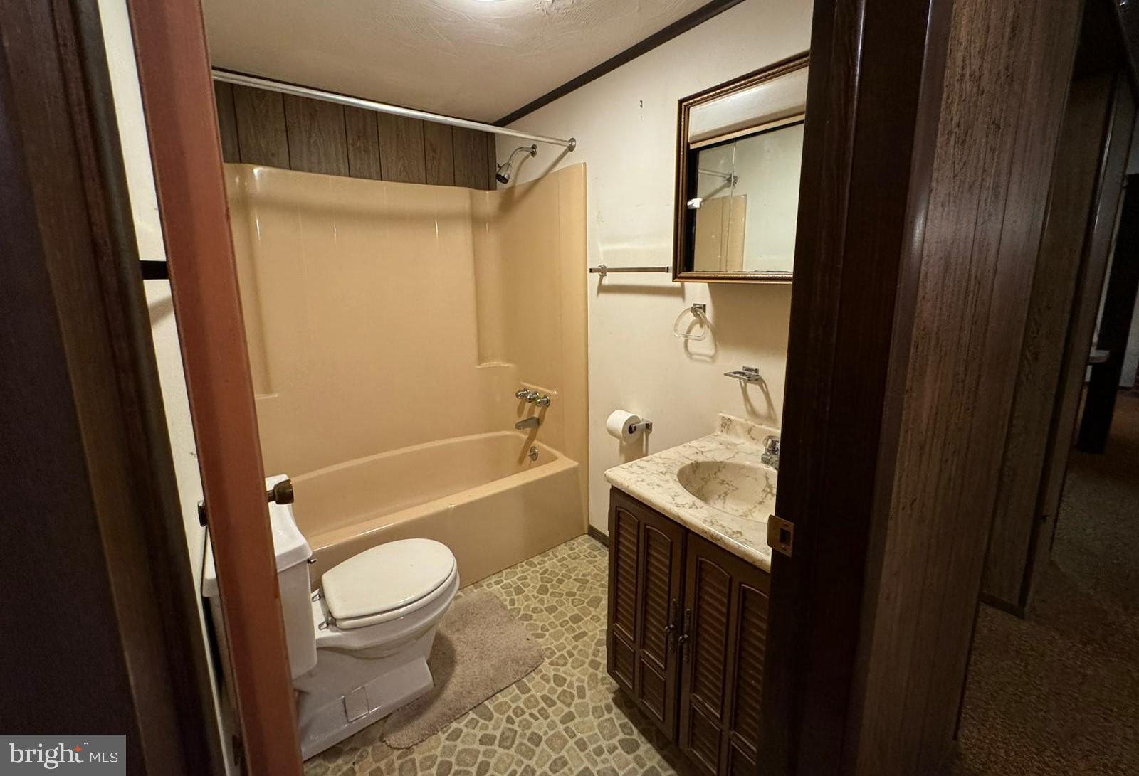 224 Shaffer Street Imler, PA 16655 - Photo 10 of 19 a bathroom with a sink toilet and shower