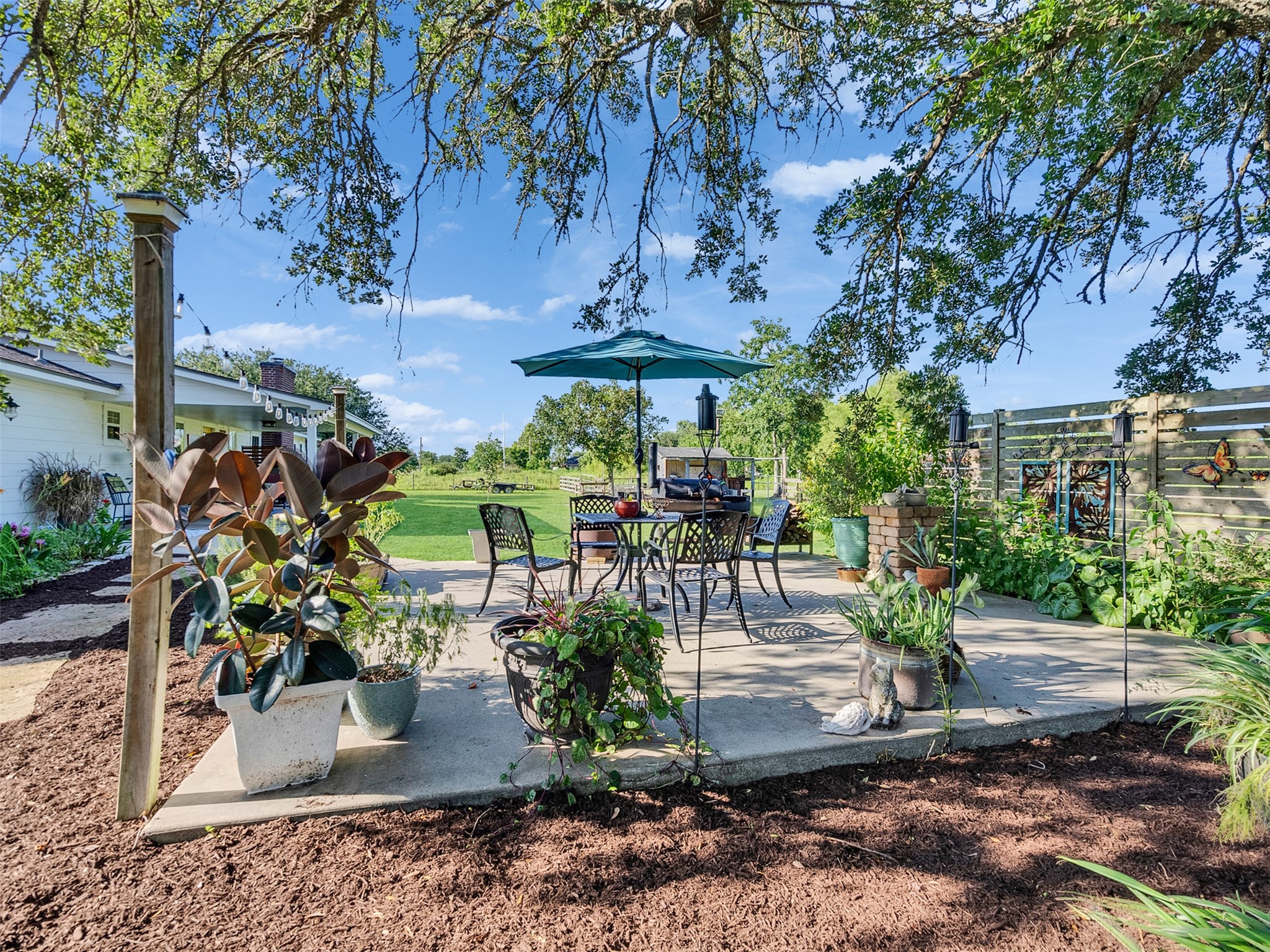 7202 Wetzel Road Dickinson, TX 77539 - Photo 37 of 46 This outdoor patio is the perfect place to dine al fresco while enjoying peaceful country views and the beauty of the Texas sky.