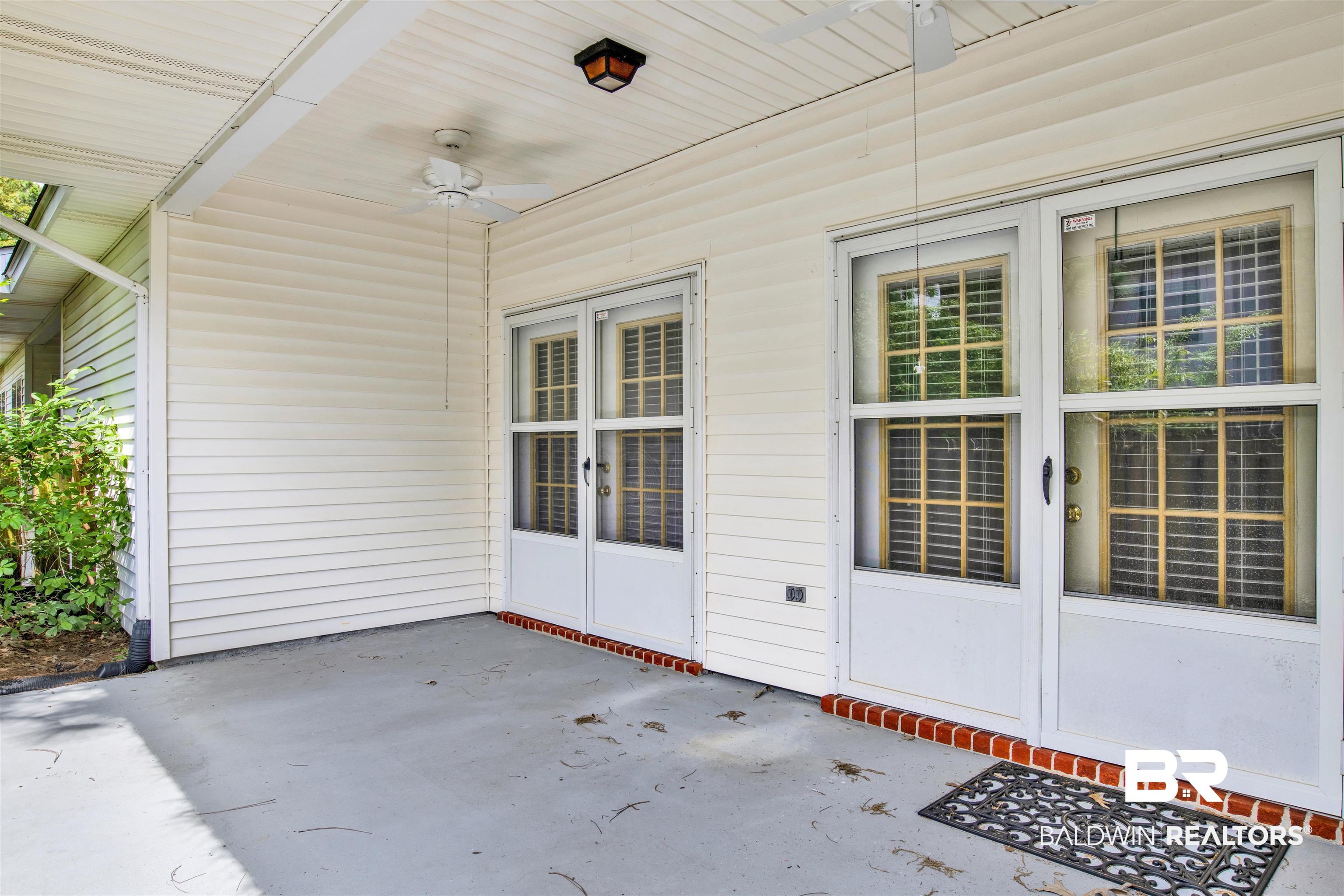 1258 Sutton Court, Unit 4 Mobile, AL 36609 - Photo 17 of 19 View of patio with ceiling fan