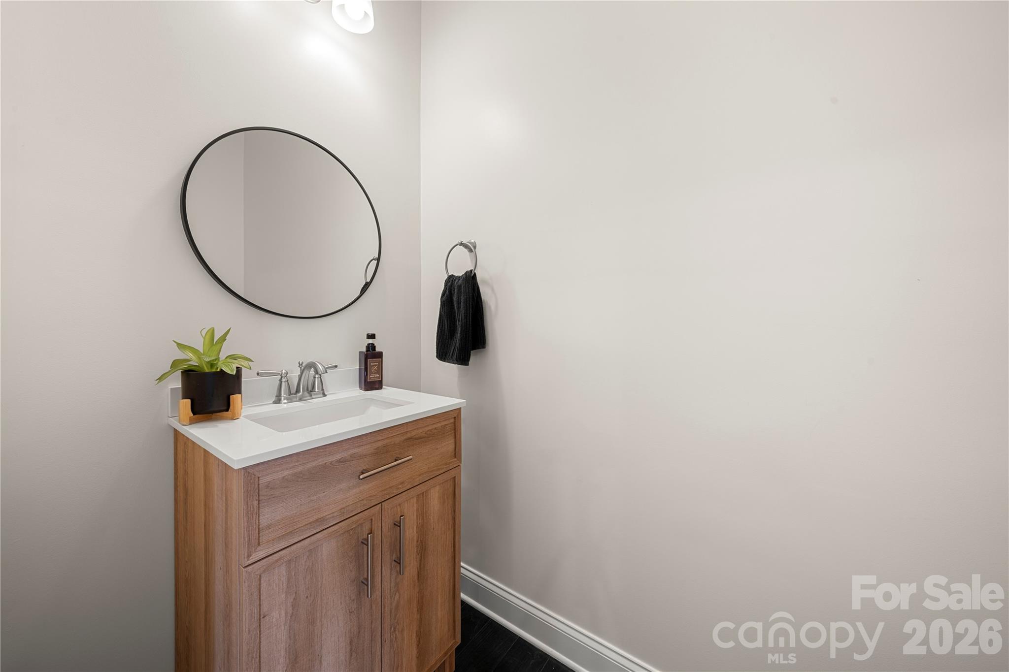 11266 Trailside Road Concord, NC 28027 - Photo 24 of 48 a bathroom with a sink and a mirror