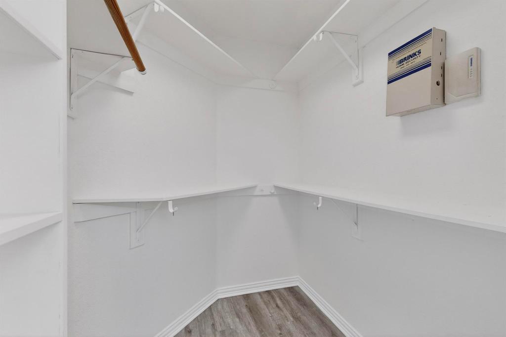 714 Ashbrook Court Euless, TX 76039 - Photo 20 of 30 Spacious master walk-in closet.