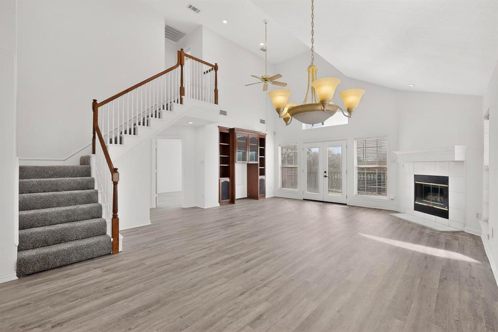 714 Ashbrook Court Euless, TX 76039 - Photo 4 of 30 Step inside to find stunning luxury vinyl plank flooring throughout the main areas, creating a seamless and sophisticated feel.
