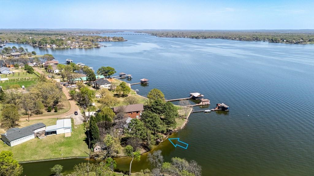 229 Esquire Estates Road Mabank, TX 75156 - Photo 12 of 19 an aerial view of a house with a lake view