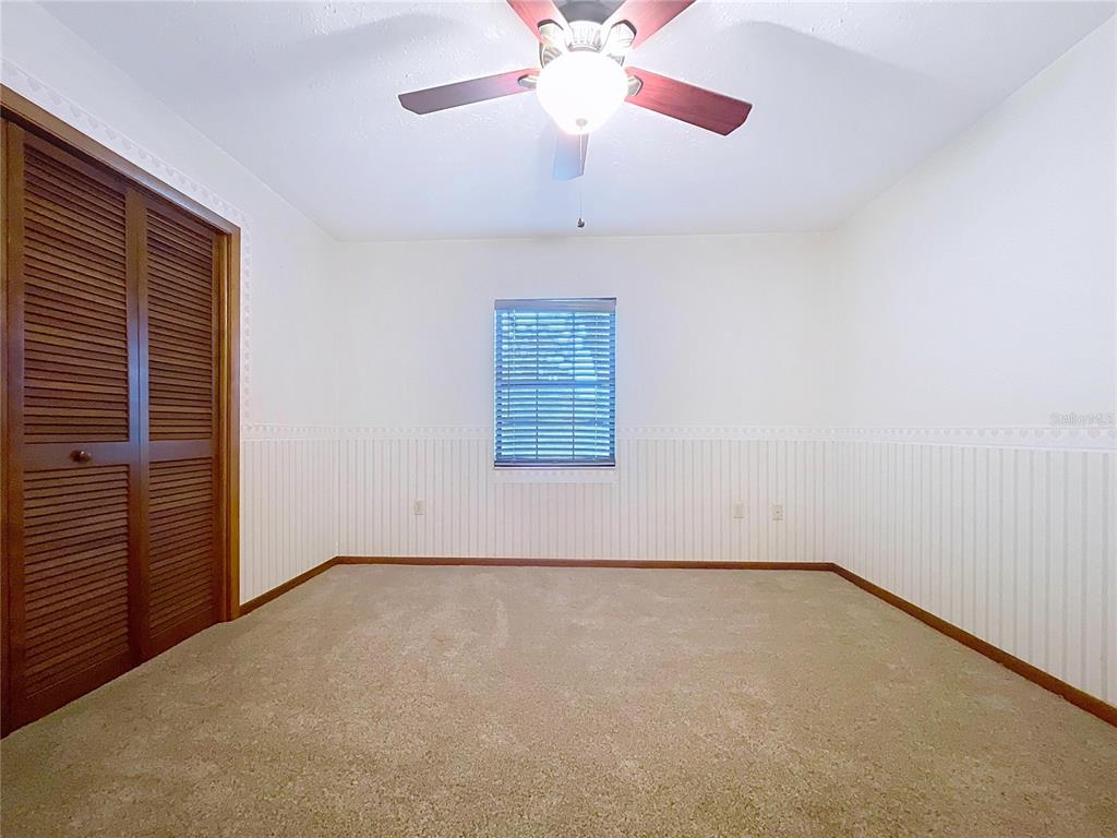 9471 McIntosh Road Dover, FL 33527 - Photo 15 of 34 a view of an empty room with a window