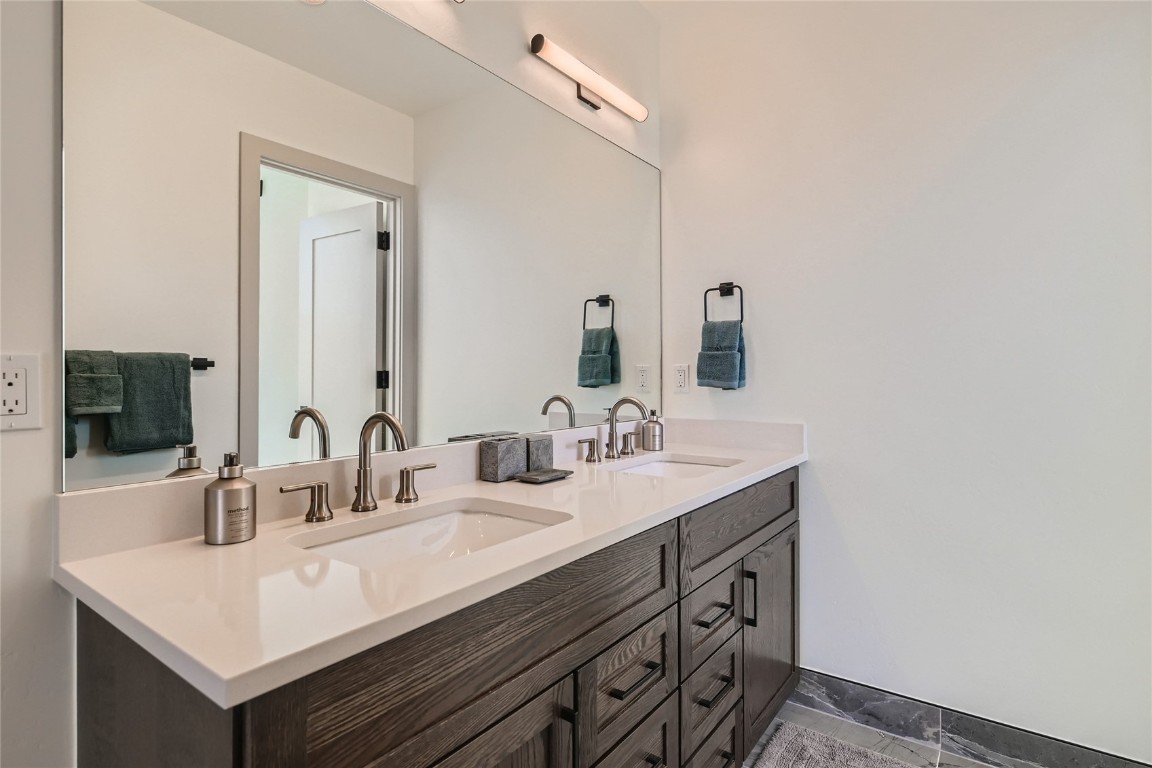 46 6th Street, Unit A1 Silverthorne, CO 80498 - Photo 19 of 28 a bathroom with a sink and a mirror