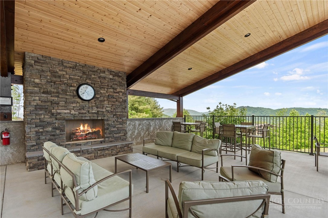142 Evening View Lane, Unit CA3 Boone, NC 28607 - Photo 29 of 41 a outdoor living space with patio furniture and garden view