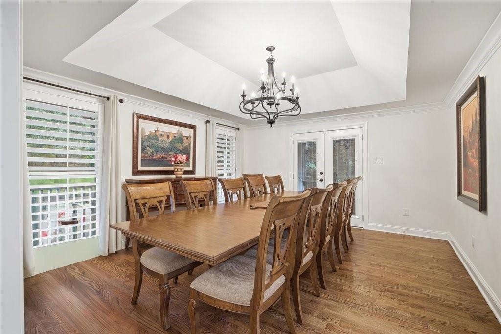 397 Thomas Road Dallas, GA 30132 - Photo 12 of 108 a view of a dining room with furniture window and wooden floor