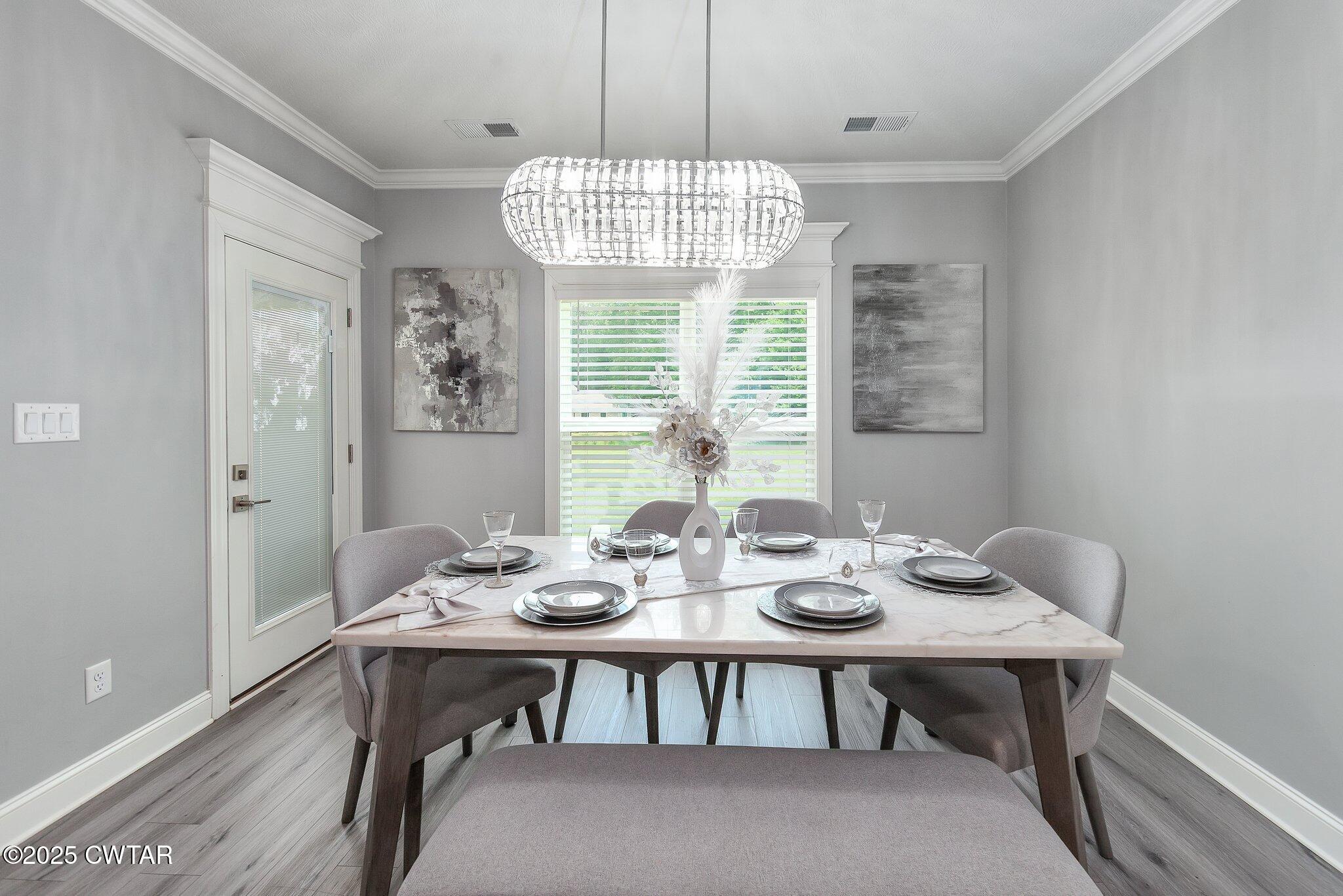 63 Westcott Cove Jackson, TN 38305 - Photo 11 of 31 a view of a dining room with furniture window and outside view