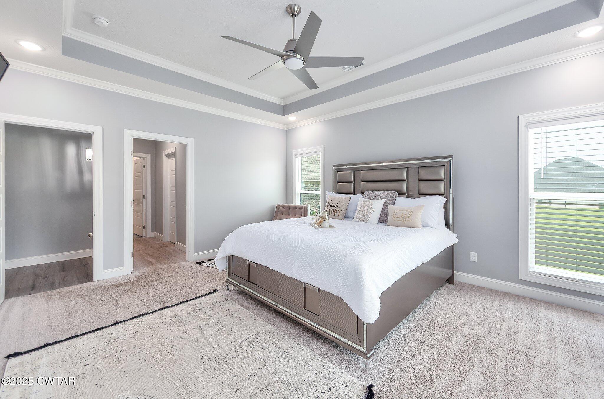 63 Westcott Cove Jackson, TN 38305 - Photo 15 of 31 a bedroom with a bed and window