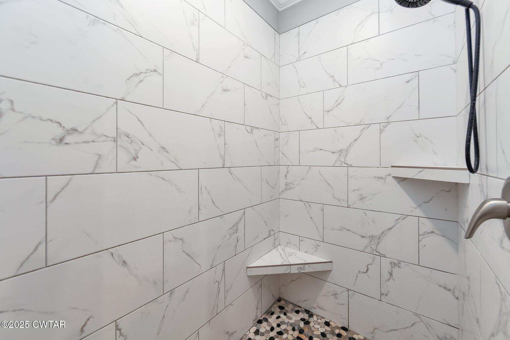 63 Westcott Cove Jackson, TN 38305 - Photo 19 of 31 a bathroom with a toilet