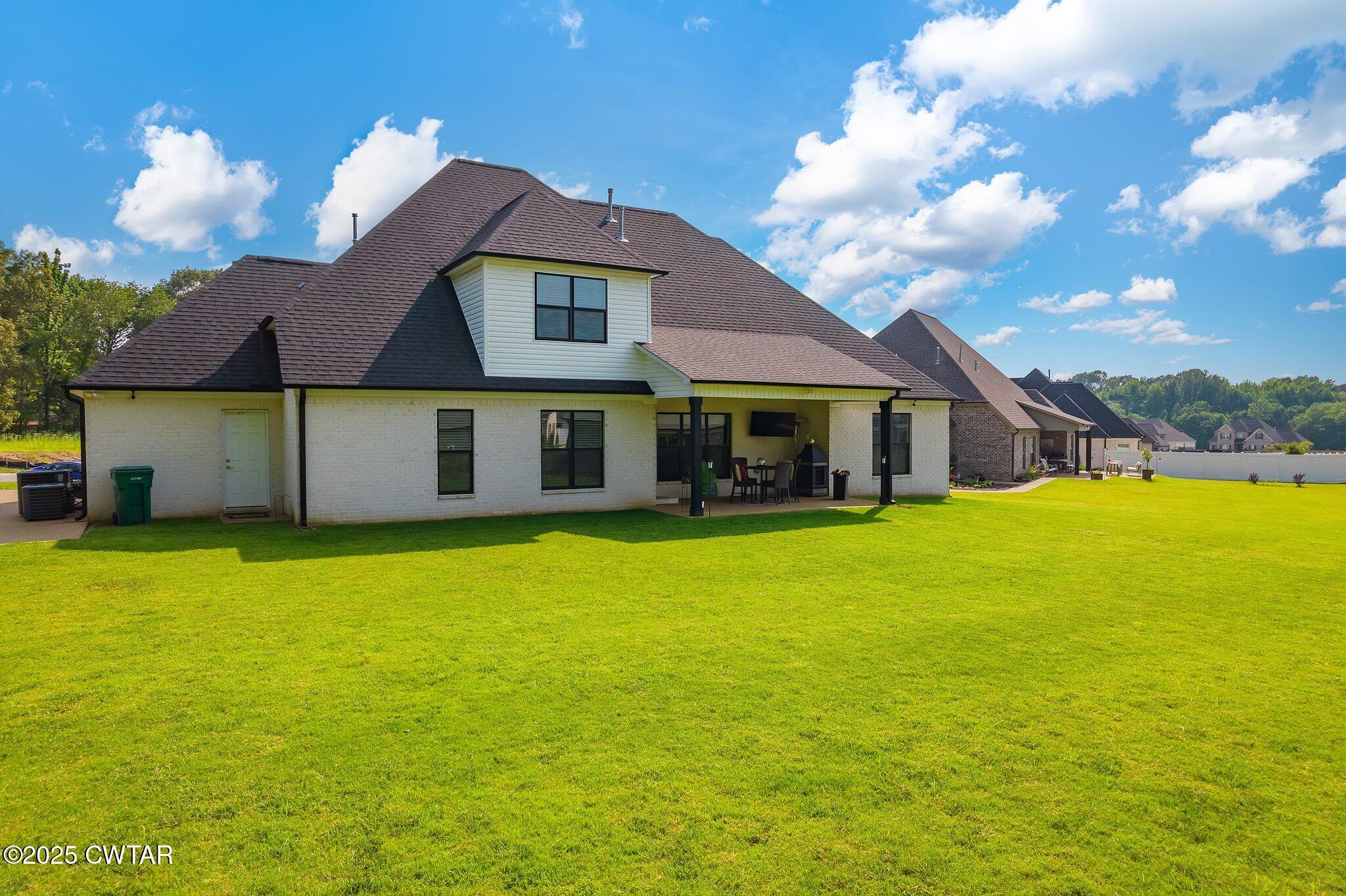 63 Westcott Cove Jackson, TN 38305 - Photo 30 of 31 a front view of house with an outdoor space and balcony