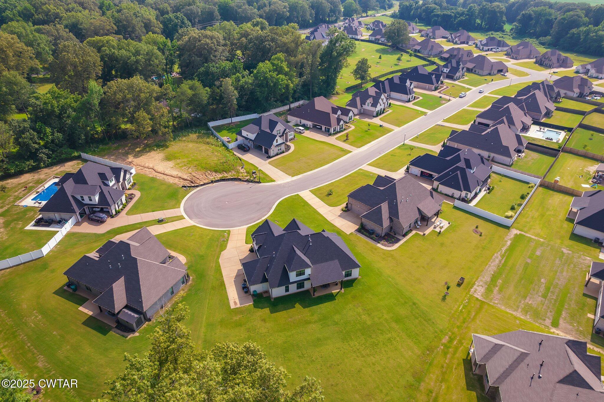 63 Westcott Cove Jackson, TN 38305 - Photo 31 of 31 a view of an outdoor space pool patio and outdoor seating