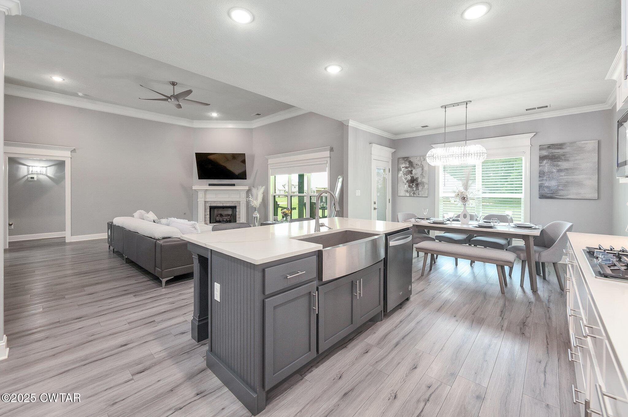 63 Westcott Cove Jackson, TN 38305 - Photo 9 of 31 a kitchen with a sink and wooden floor