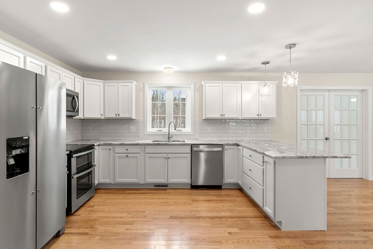 76 Laurel Road, Unit 28 Hooksett, NH 03106 - Photo 3 of 40