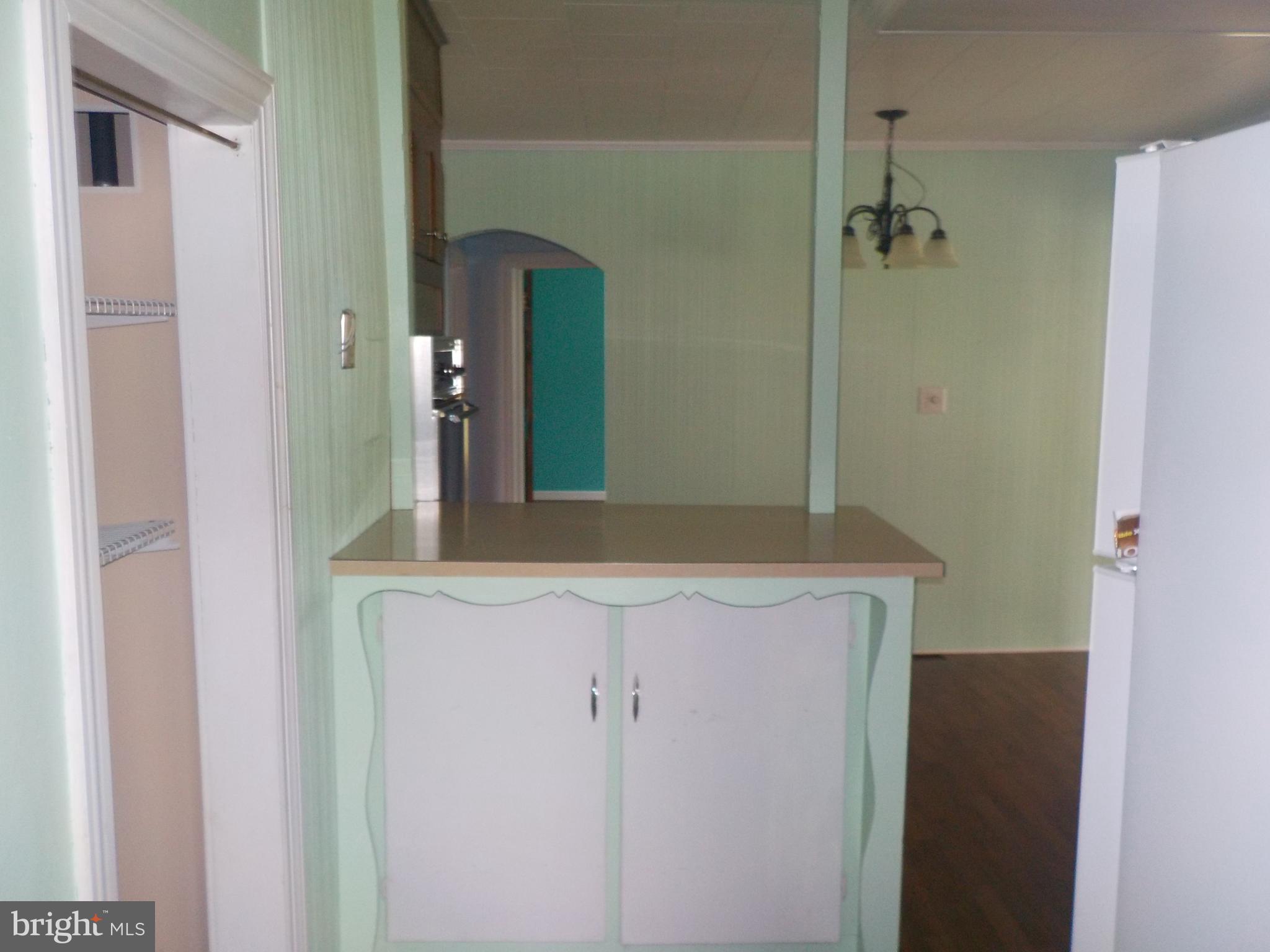 1419 Stone Boundary Road Cambridge, MD 21613 - Photo 9 of 21 Kitchen with breakfast bar