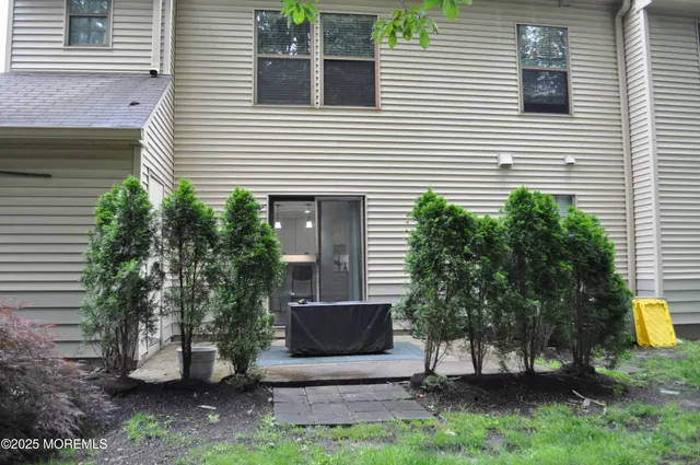 a view of a utility room with granite countertop