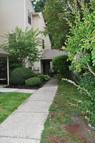 a view of a porch with seating space