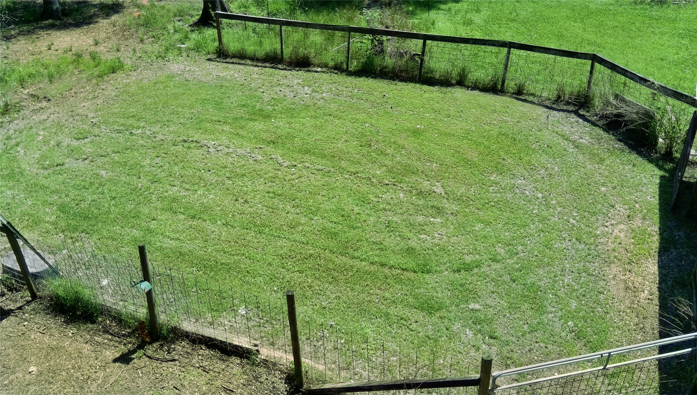 27894 East River Road Splendora, TX 77372 - Photo 5 of 12 a view of a backyard