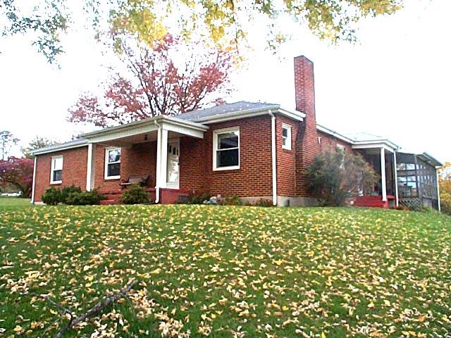 2532 Rutrough Road Southeast Roanoke, VA 24014 - Photo 1 of 9 a front view of a house with garden