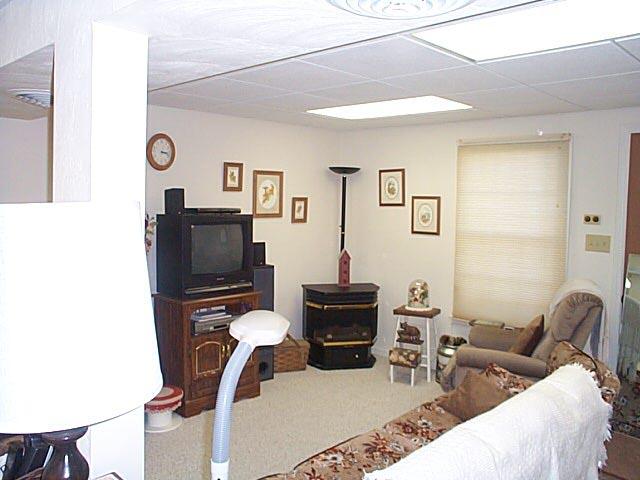 2532 Rutrough Road Southeast Roanoke, VA 24014 - Photo 9 of 9 a living room with furniture a flat screen tv and a piano