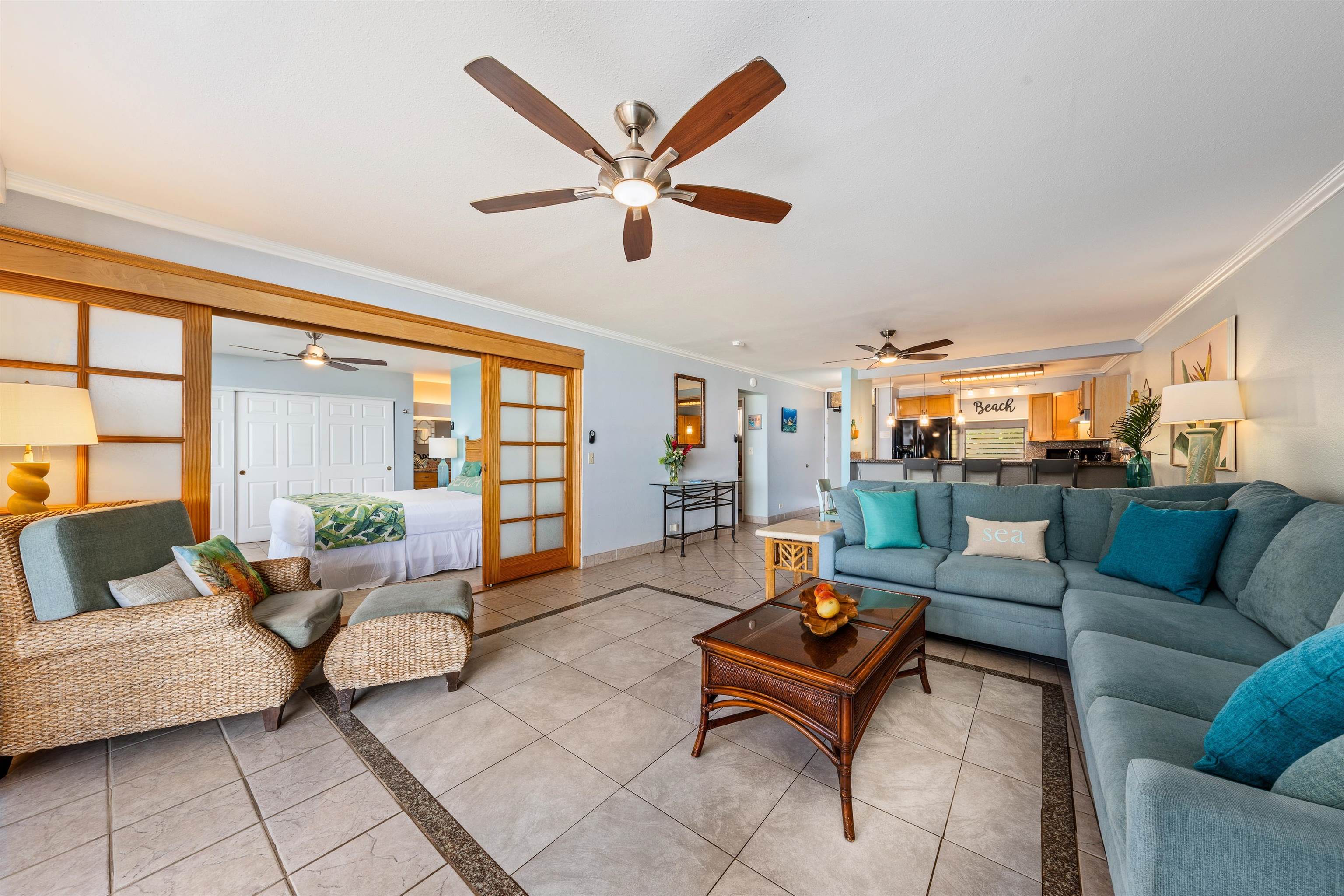 3615 Lower Honoapiilani Road, Unit 123 Lahaina, HI 96761 - Photo 18 of 41 a living room with furniture and a large window