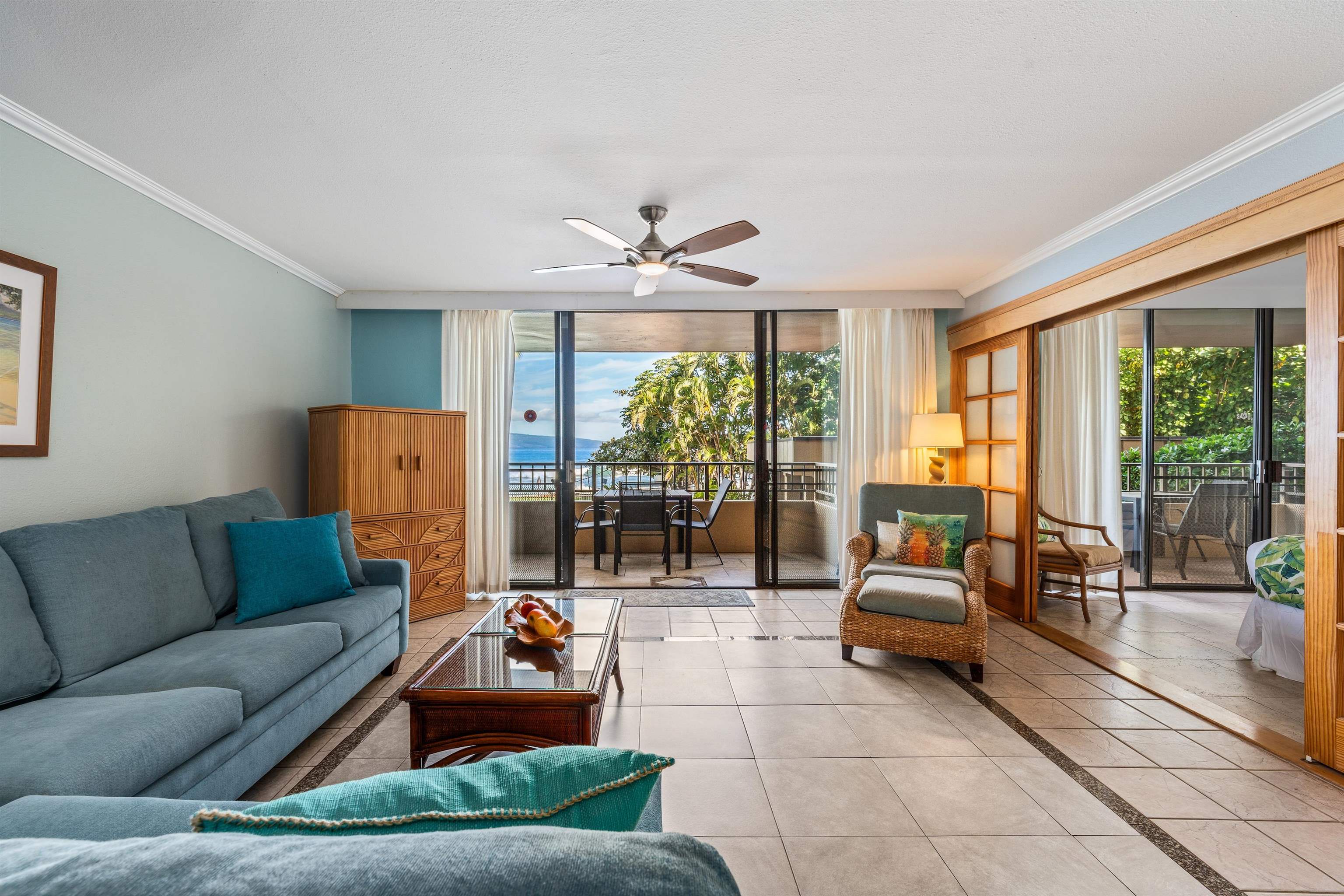 3615 Lower Honoapiilani Road, Unit 123 Lahaina, HI 96761 - Photo 19 of 41 a living room with furniture and a large window