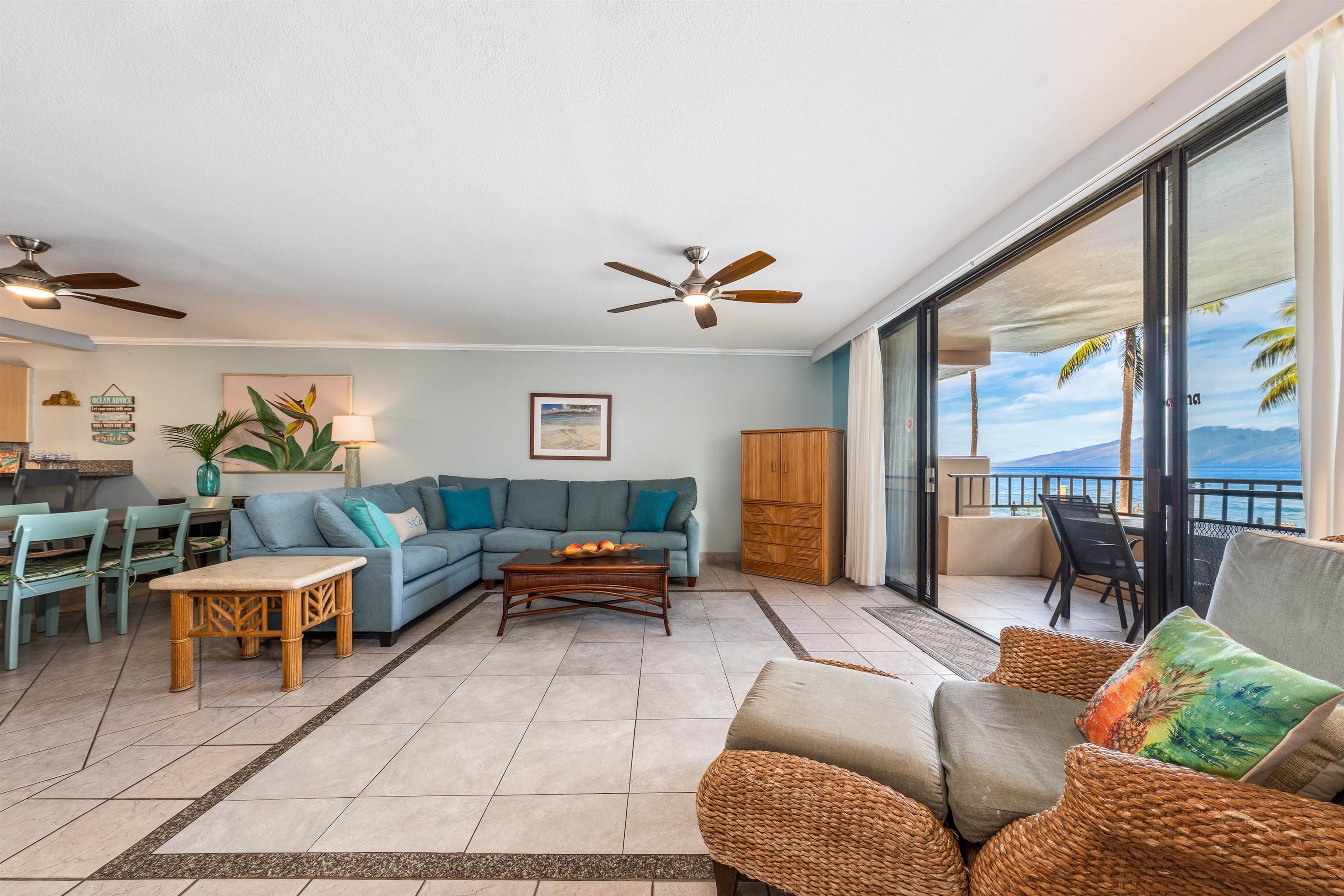 3615 Lower Honoapiilani Road, Unit 123 Lahaina, HI 96761 - Photo 2 of 41 a living room with furniture and a large window