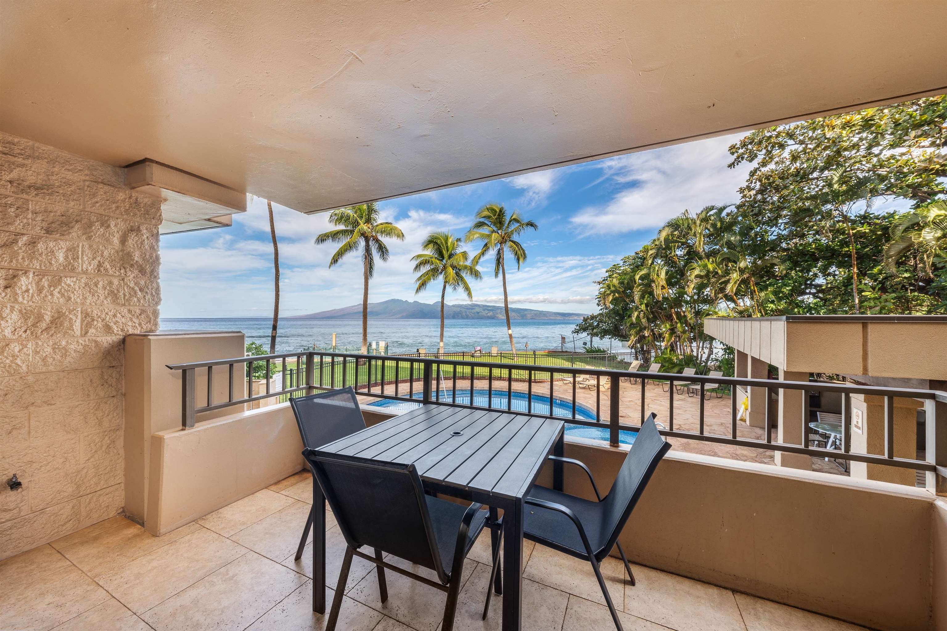 3615 Lower Honoapiilani Road, Unit 123 Lahaina, HI 96761 - Photo 32 of 41 a view of a chairs and table in the balcony