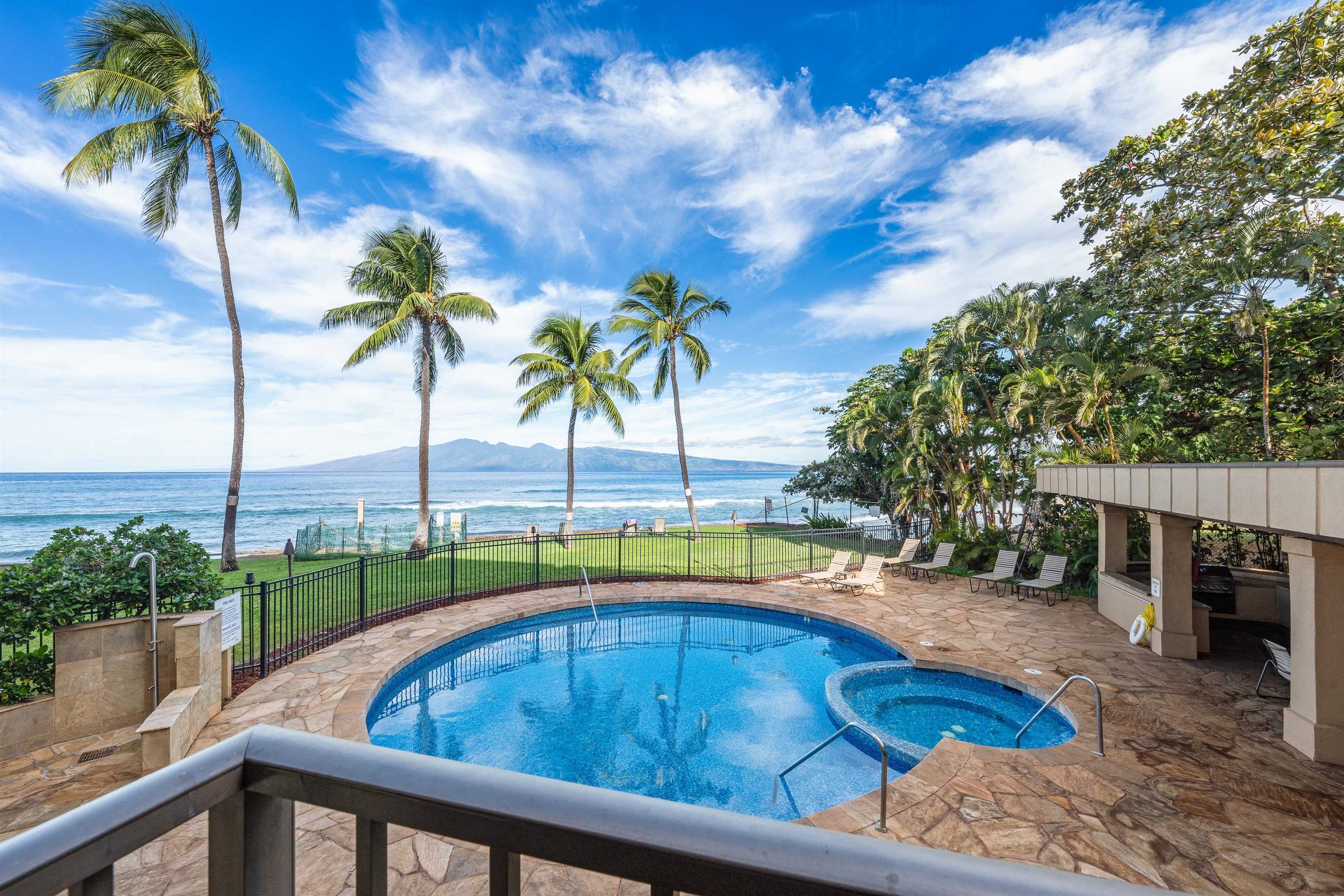 3615 Lower Honoapiilani Road, Unit 123 Lahaina, HI 96761 - Photo 41 of 41 a view of swimming pool with a patio and a yard