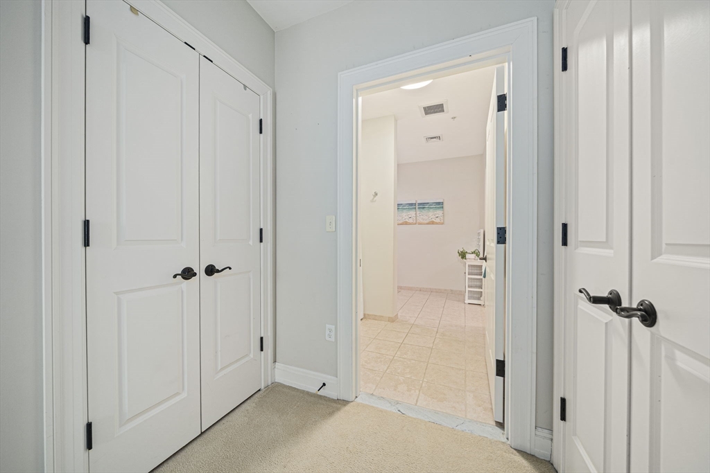 59 Walpole Street, Unit 115 Canton, MA 02021 - Photo 18 of 41 a view of a bathroom with a shower
