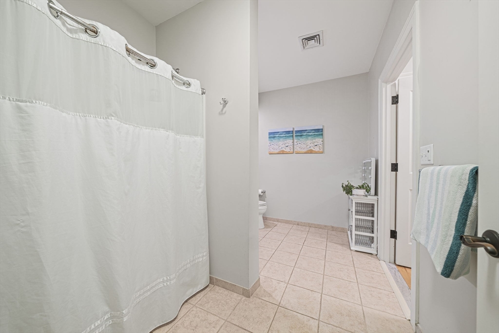 59 Walpole Street, Unit 115 Canton, MA 02021 - Photo 19 of 41 a view of walk in closet with clothes