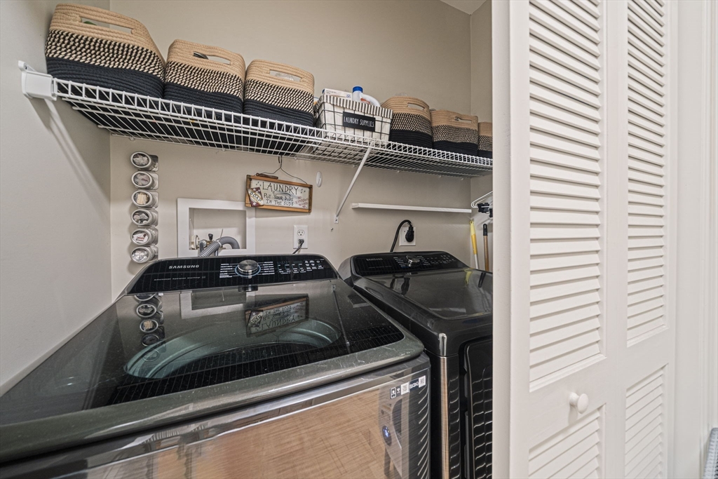 59 Walpole Street, Unit 115 Canton, MA 02021 - Photo 24 of 41 a close view of a stove top oven sitting inside of a kitchen