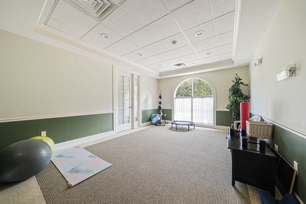 59 Walpole Street, Unit 115 Canton, MA 02021 - Photo 33 of 41 a view of a livingroom with furniture and window