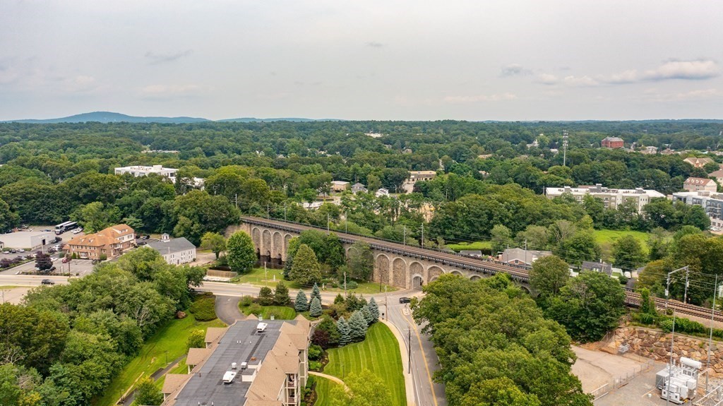 59 Walpole Street, Unit 115 Canton, MA 02021 - Photo 38 of 41 an aerial view of a city with houses