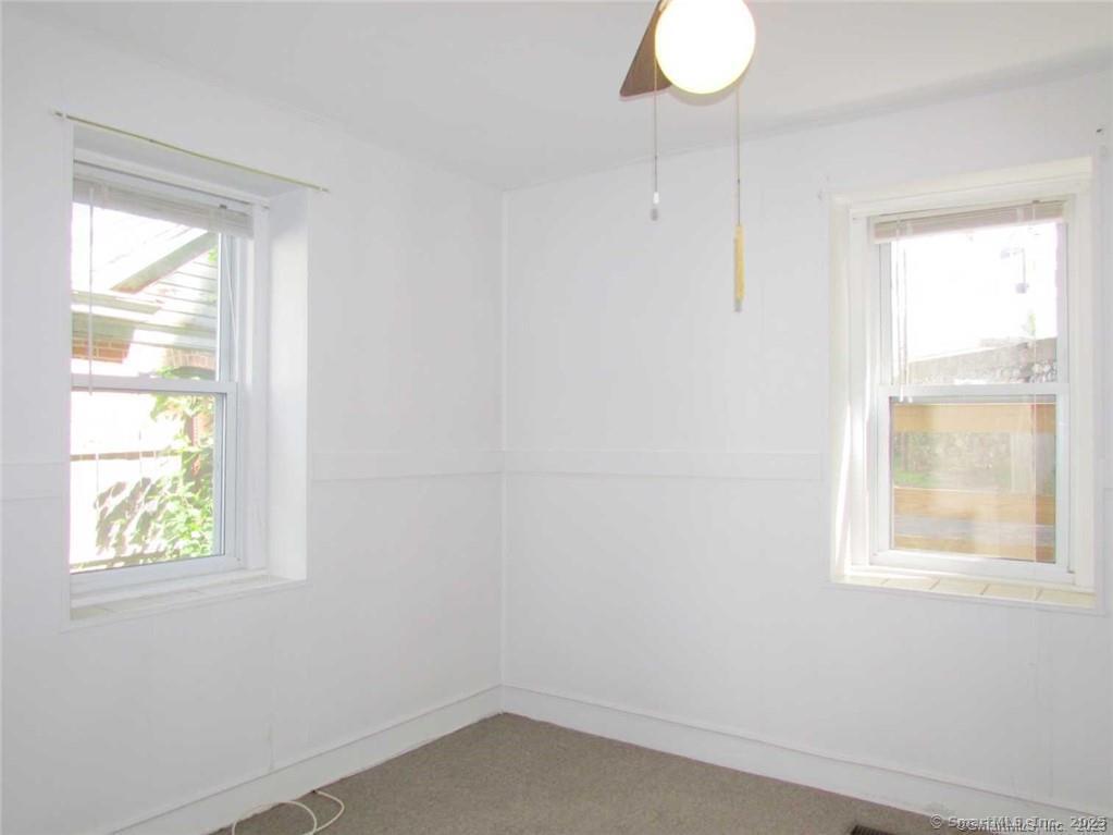 44 Brookside Avenue, Unit U2 Torrington, CT 06790 - Photo 7 of 10 a small space with a window