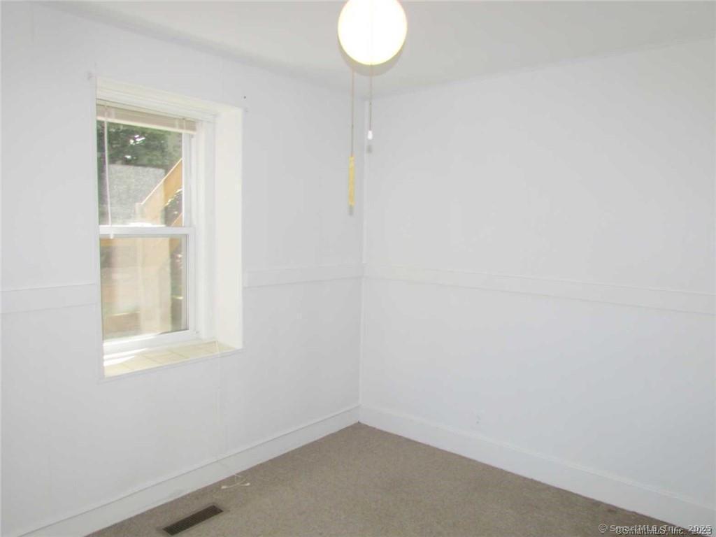 44 Brookside Avenue, Unit U2 Torrington, CT 06790 - Photo 8 of 10 a small space with a window