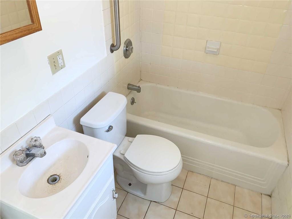 44 Brookside Avenue, Unit U2 Torrington, CT 06790 - Photo 10 of 10 a bathroom with a sink and a toilet