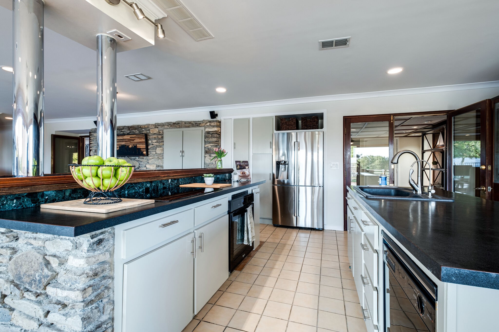1338 Campbell Road Goodlettsville, TN 37072 - Photo 18 of 48 a kitchen with stainless steel appliances granite countertop a sink a stove and a refrigerator