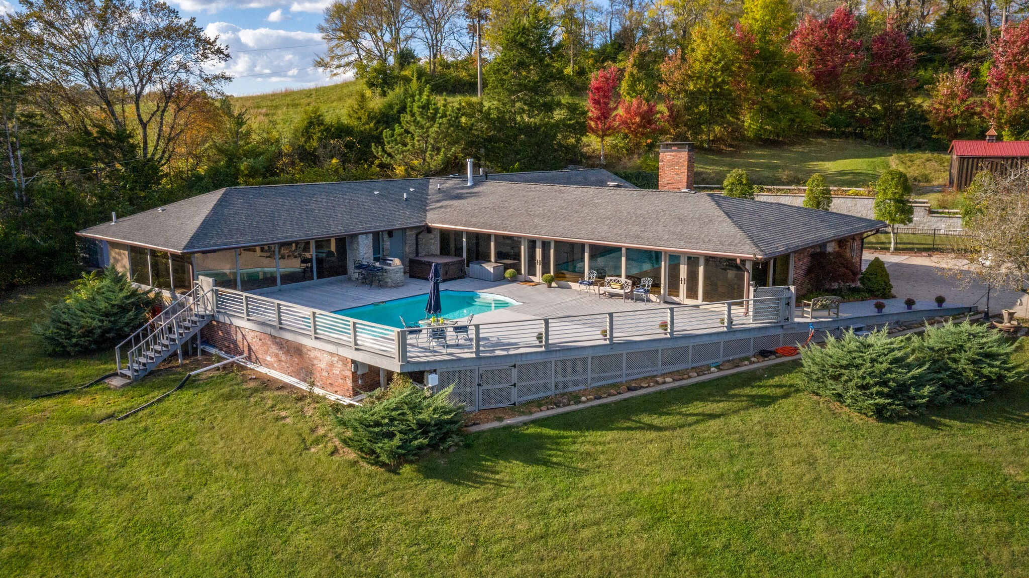 1338 Campbell Road Goodlettsville, TN 37072 - Photo 4 of 48 a aerial view of a house with a yard table and chairs