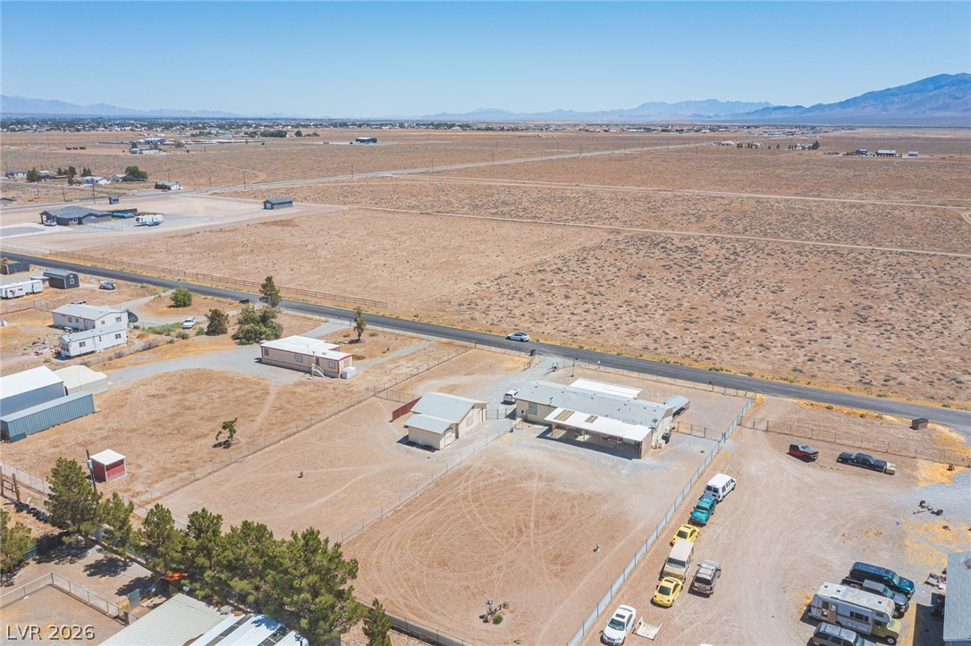 3200 Maple Road Pahrump, NV 89048 - Photo 49 of 53 A sprawling rural property featuring a large structure and abundant open land, offering vast potential for development.