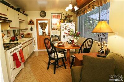 5200 Montecito Avenue Santa Rosa, CA 95404 - Photo 5 of 9 a view of a dining room with furniture and chandelier