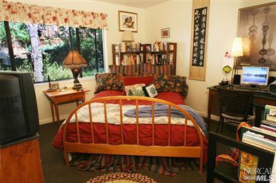 5200 Montecito Avenue Santa Rosa, CA 95404 - Photo 6 of 9 a bedroom with furniture and a window