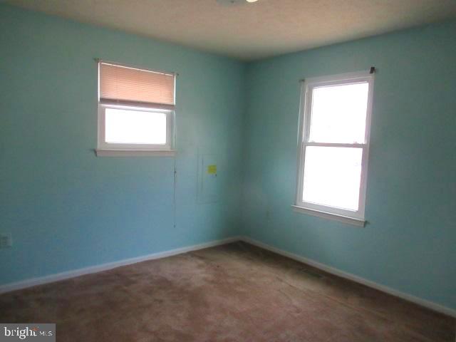 665 Flagstaff Road Lusby, MD 20657 - Photo 6 of 11 an empty room with a window