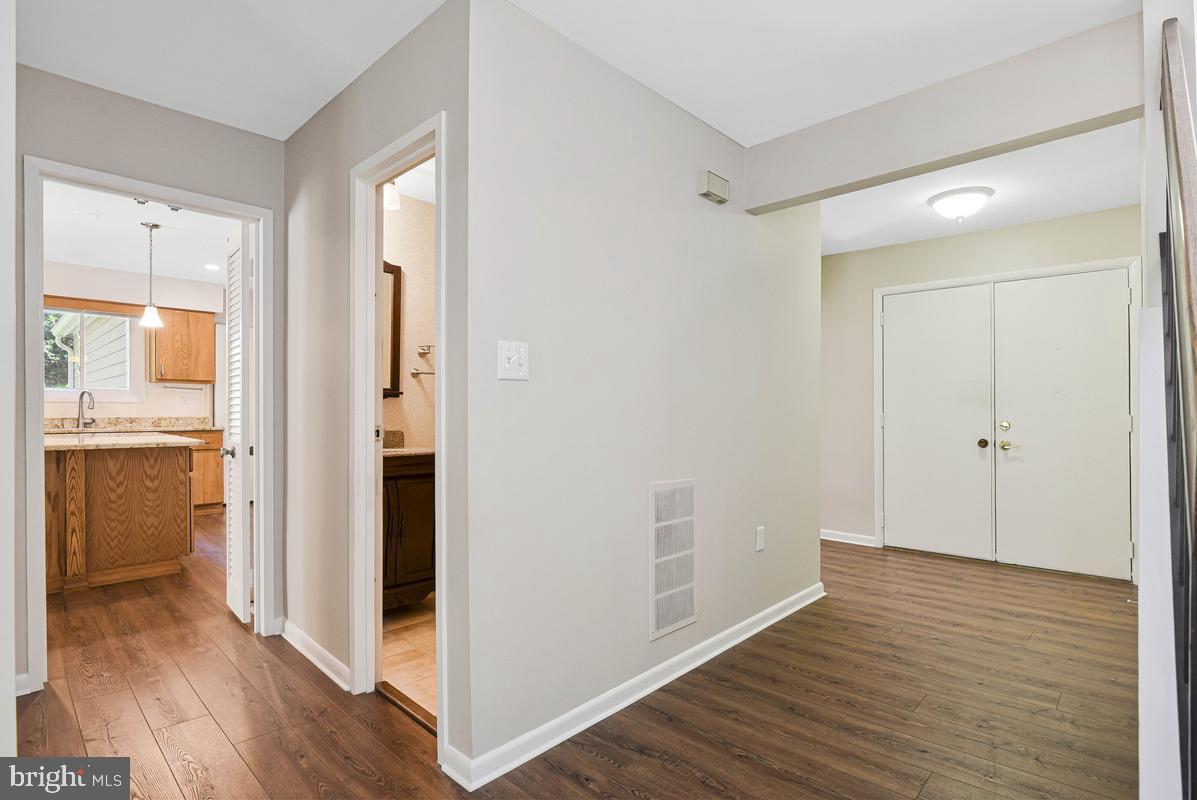 11814 Blue Spruce Road Reston, VA 20191 - Photo 14 of 56 Hallway between kitchen and foyer