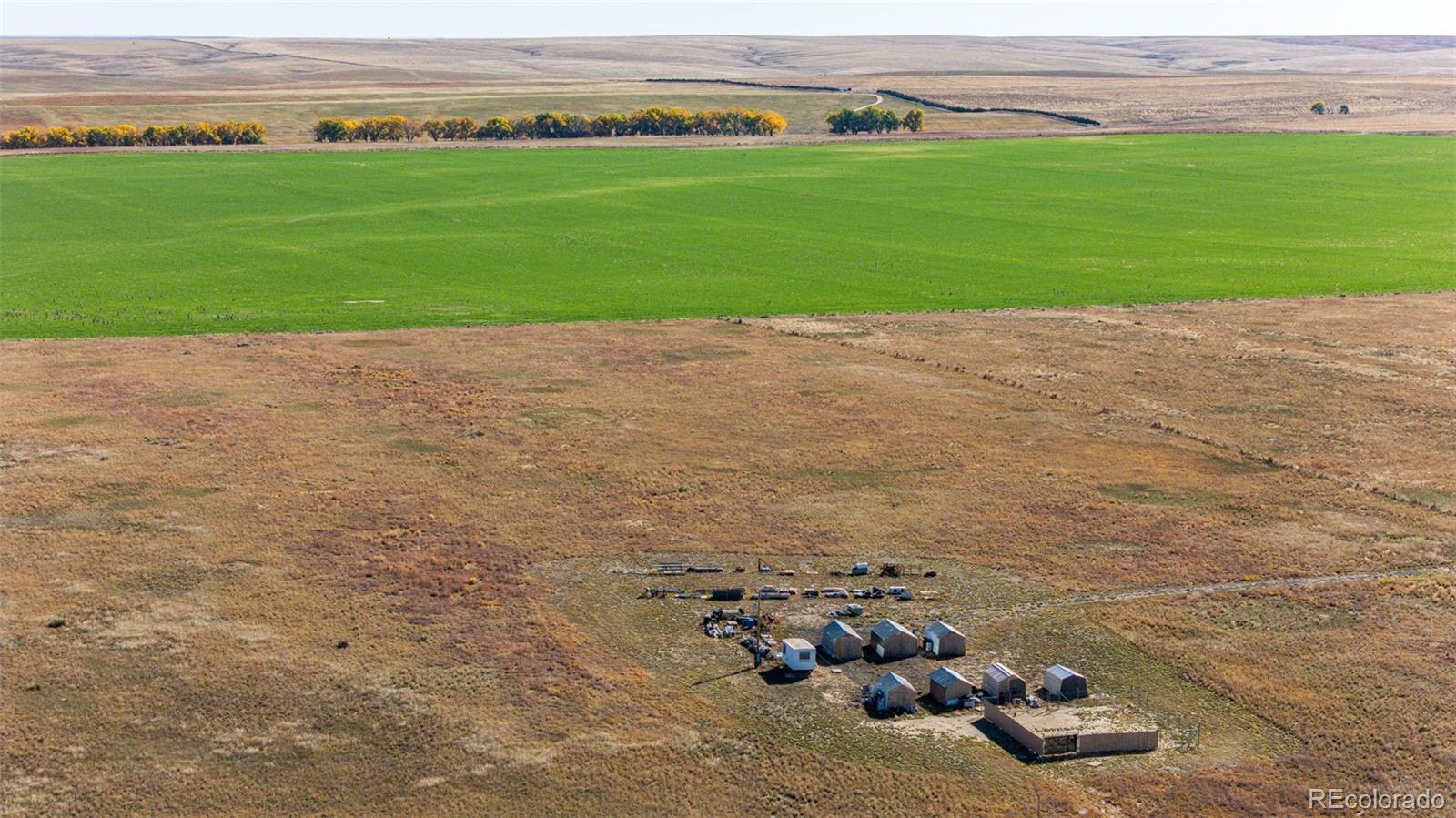 13340 Deter-Winters Road Byers, CO 80103 - Photo 6 of 12 a view of a road with an ocean view