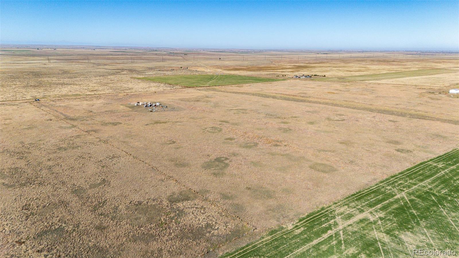 13340 Deter-Winters Road Byers, CO 80103 - Photo 10 of 12 a view of an ocean and beach