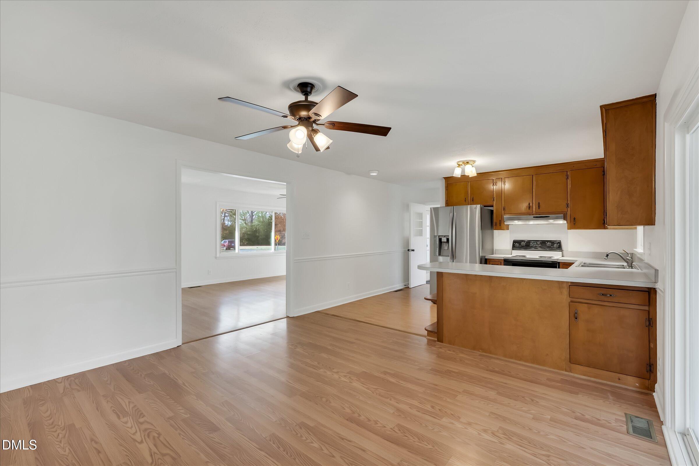4108 Campbell Road Raleigh, NC 27606 - Photo 9 of 42 a view of a kitchen with microwave and cabinets