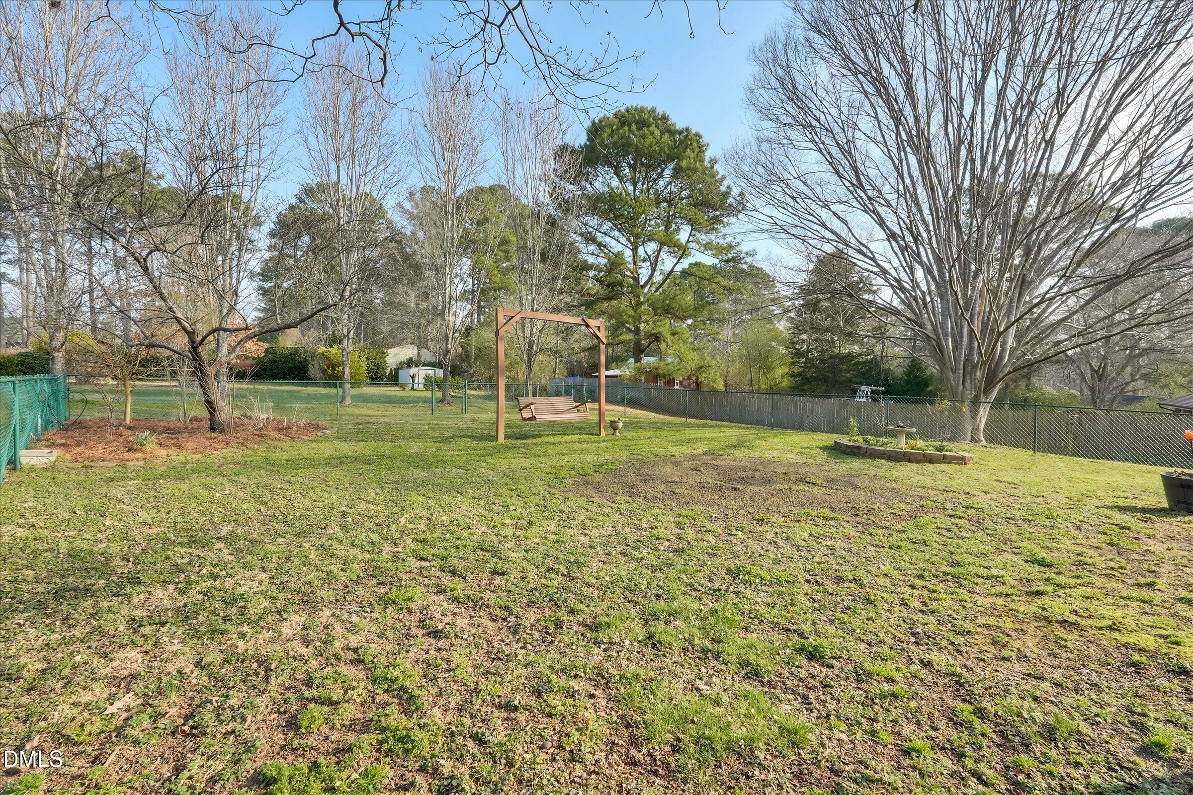 4108 Campbell Road Raleigh, NC 27606 - Photo 23 of 42 a view of a park with large trees